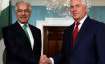 File photo of US Secretary of State Rex Tillerson R shaking