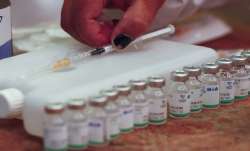 A nurse prepares a shot of the Sputnik V vaccine for