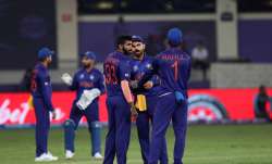 India skipper Virat Kohli in conversation with Jasprit Bumrah and KL Rahul during their clash agains