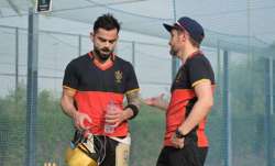 RCB skipper Virat Kohli (left) with team's Director of Cricket Operation Mike Hesson