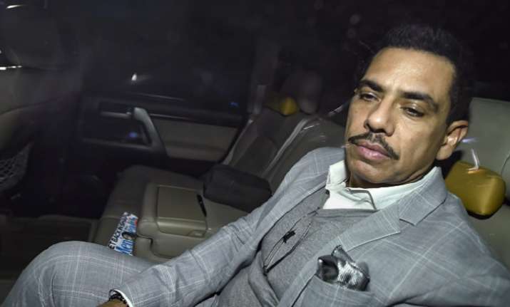 Businessman Robert Vadra leaves after appearing