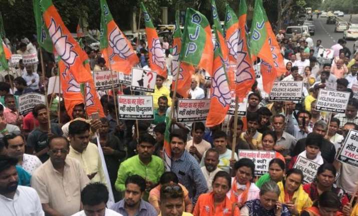 BJP workers protest the killing of a party worker in West