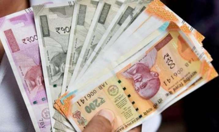 Rupee rises 13 paise to 69.22 vs US dollar in early trade.