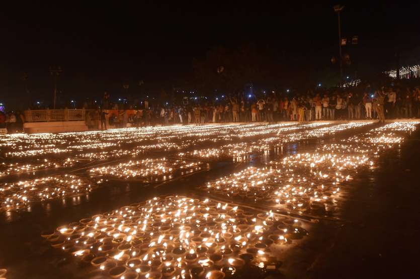Earthen lamps lit on the bank of River Saryu in Ayodhya as part of 'Deepotsava' celebrations.