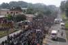 About a thousand migrants, including women and children,