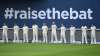 The England team stand for a minutes silence for those
