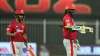 Chris Gayle with Mandeep Singh