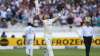 Joe Root of England celebrates reaching his century during