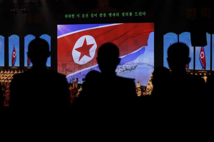 North Koreans military cadets are silhouetted near the
