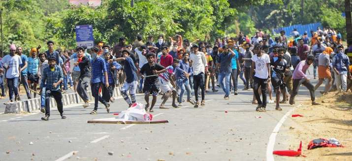 BJP workers hurls bricks and stones at the CPI office