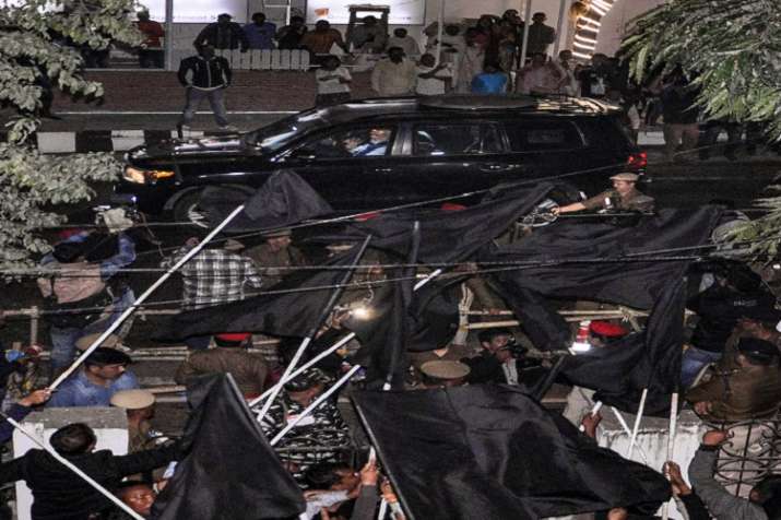 AASU activists show black flag to Prime Minister