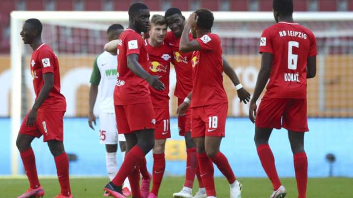 Leipzig's Timo Werner, center, celebrates with team mates