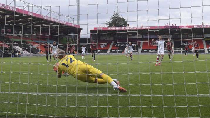 Bournemouth's goalkeeper Aaron Ramsdale saves a penalty