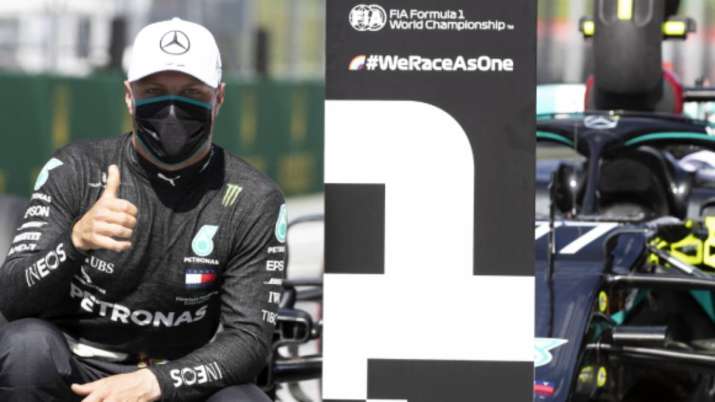 Mercedes driver Valtteri Bottas of Finland, wearing a mask