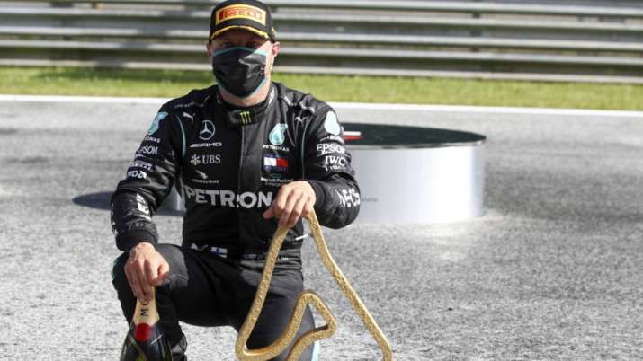 Mercedes driver Valtteri Bottas of Finland poses with his