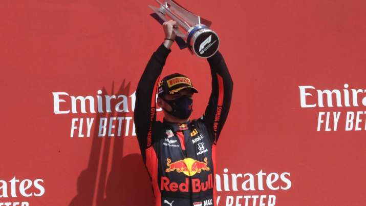 Red Bull driver Max Verstappen of the Netherlands holds up