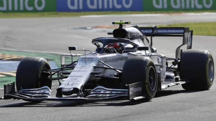AlfaTauri driver Pierre Gasly of France steers his car