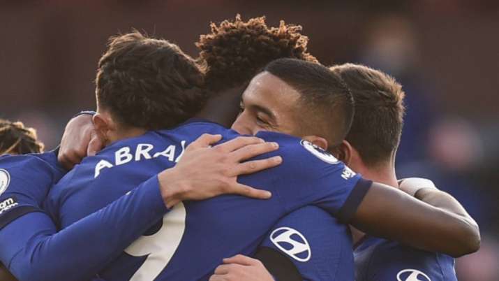 Chelsea players celebrate with Hakim Ziyech, centre right,