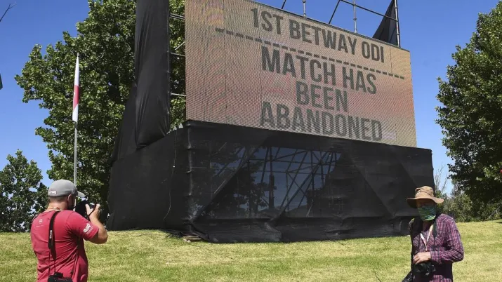 A board announces Sunday, Dec. 6, 2020, that the first ODI