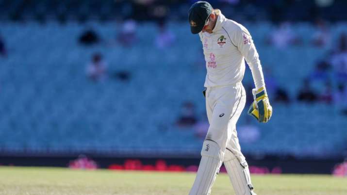 Australian captain Tim Paine reacts during play on the