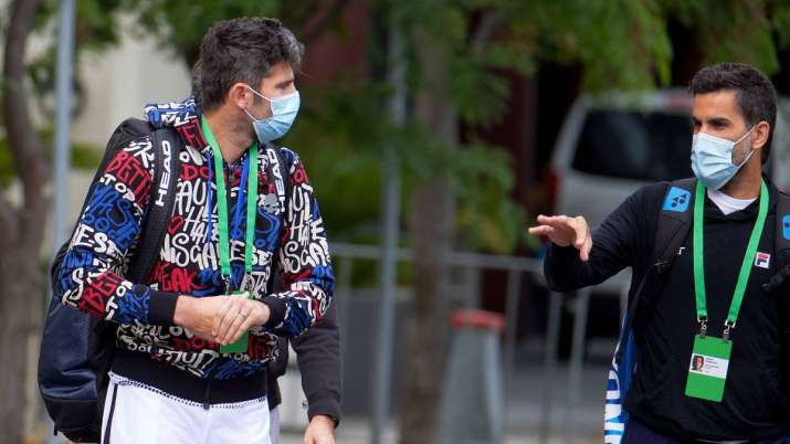Italian tennis player Simone Bolelli, left, and Argentina's
