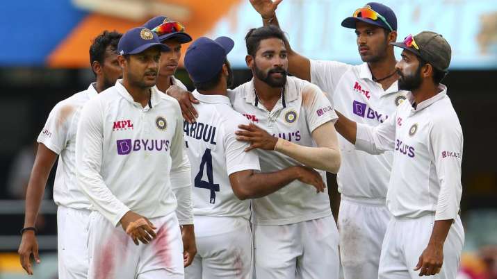 India's Mohammed Siraj, centre, is congratulated by