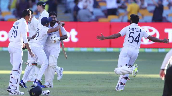 Indian players celebrate after defeating Australia by three