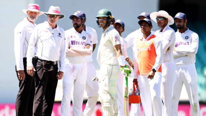 Umpires Paul Reiffel and Paul Wilson, Mohammed Siraj of