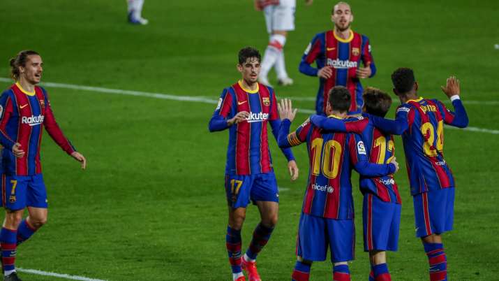 Barcelona's Lionel Messi celebrates after scoring his