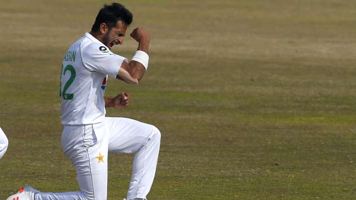 Pakistan's Hasan Ali celebrates after taking the wicket of