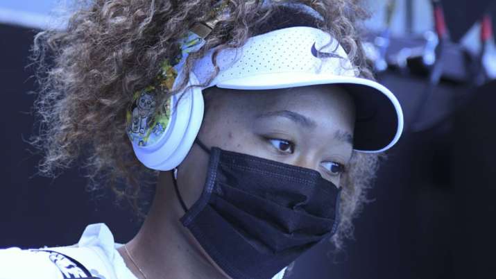 Japan's Naomi Osaka walks out onto court for her match