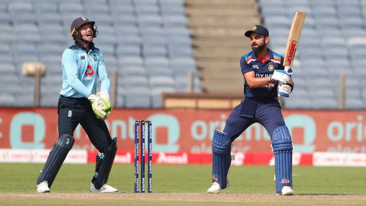 England wicketkeeper Jos Buttler celebrates after catching