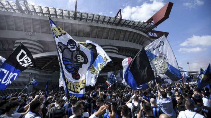 Inter Milan's supporters celebrate their team's Serie A