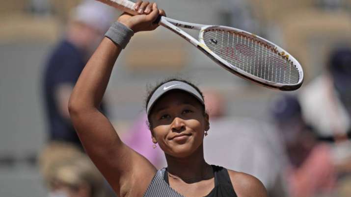 Japan's Naomi Osaka celebrates after defeating Romania's
