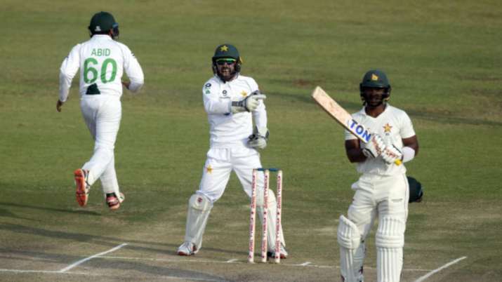 Pakistan wicketkeeper Mohammad Rizwan, centre, celebrates