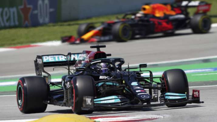 Mercedes driver Lewis Hamilton of Britain takes a curve