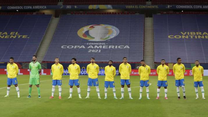 Brazil's players stand during the national anthem prior to
