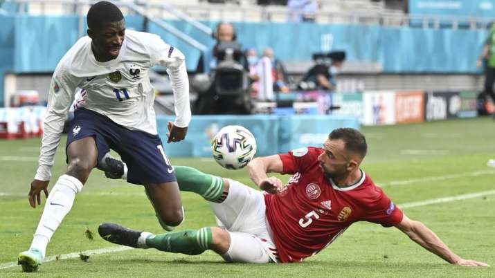Hungary's Attila Fiola, right, challenges France's Ousmane