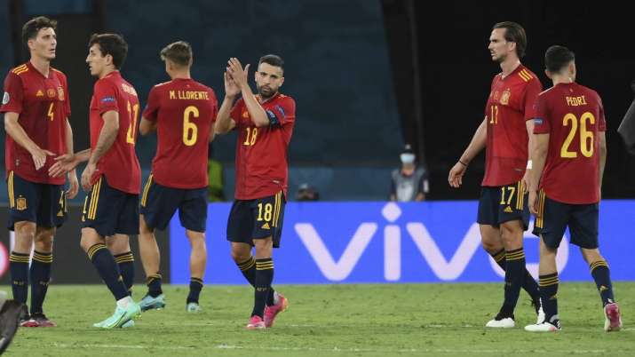 Spanish players react after the Euro 2020 soccer
