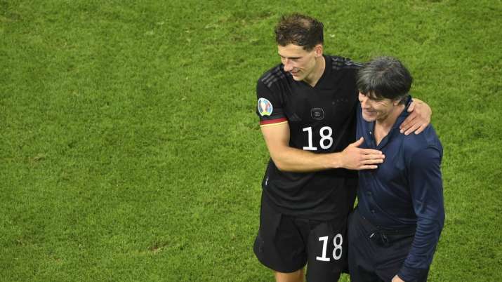 Germany's manager Joachim Loew greets Germany's Leon