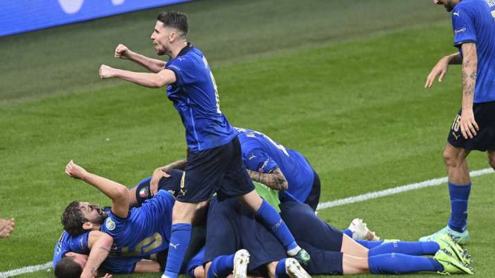 Italy's players celebrate after scoring their side's second