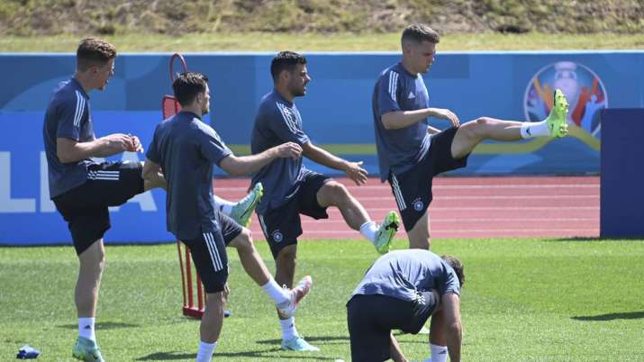 From left rear, Germany's Lukas Klostermann , Jonas