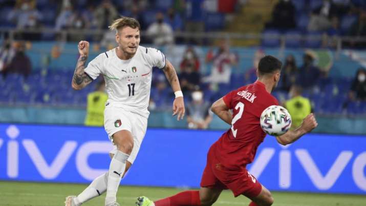 Italy's Ciro Immobile scores his side's second goal during