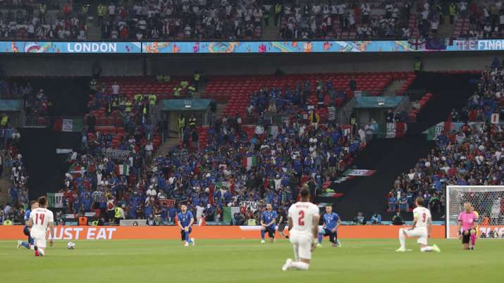 The players take a knee before the Euro 2020 soccer