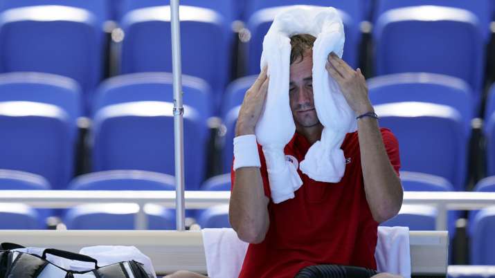 Daniil Medvedev, of the Russian Olympic Committee, cools