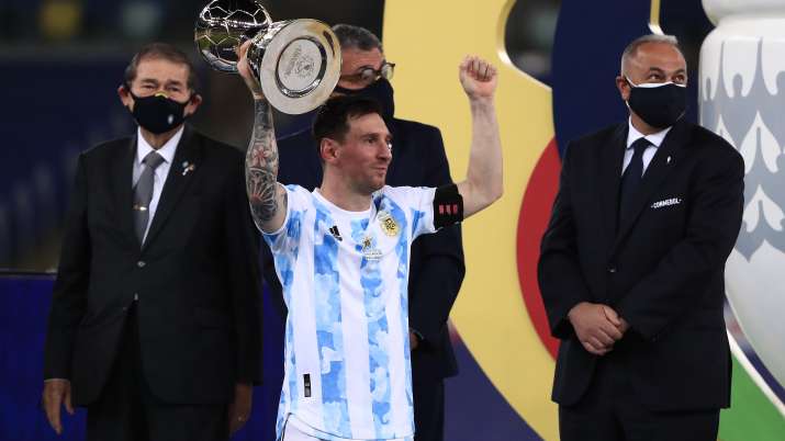 Lionel Messi of Argentina lifts his top scorer award after