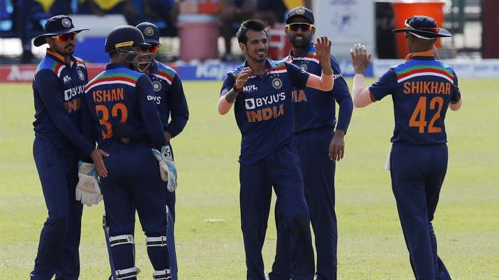 Yuzvendra Chahal, center, celebrates the wicket of Sri