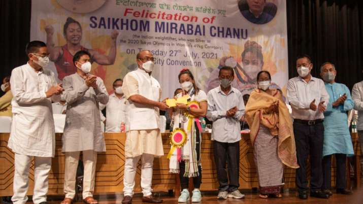 CM Biren Singh handed over a cheque of Rs. 1 crore and an