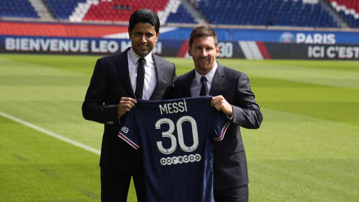Lionel Messi, right, and PSG president Nasser