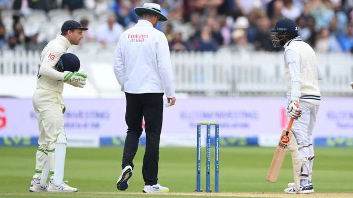 India batsman Jasprit Bumrah talks with England